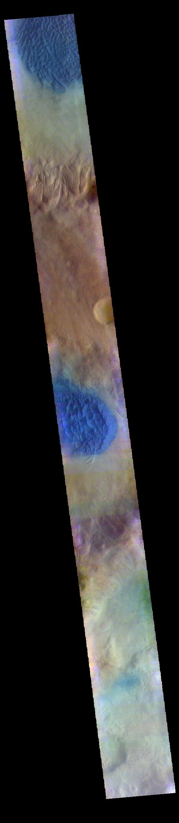 The THEMIS VIS camera contains 5 filters. The data from different filters can be combined in multiple ways to create a false color image. These false color images may reveal subtle variations of the surface not easily identified in a single band image. Today's false color image shows dunes in several craters in Noachis Terra. As with other craters in this region, large mounds of sand dunes are located on the crater floors. Wind directions that blow from east south east to west north west (lower right corner to upper left corner of the image) are arising from Hellas Planitia.  Orbit Number: 67462 Latitude: -48.7336 Longitude: 34.0451 Instrument: VIS Captured: 2017-02-27 18:15  https://photojournal.jpl.nasa.gov/catalog/PIA24059
