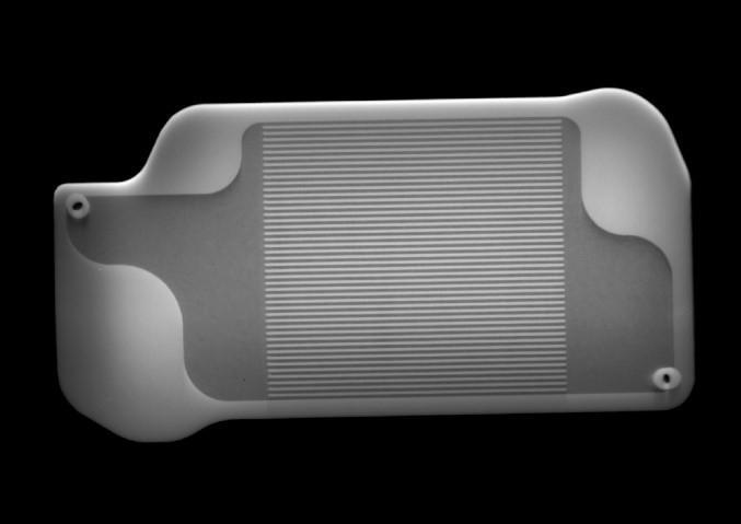 This X-ray image shows the interior of a palm-size 3D-printed heat exchanger inside Perseverance's Mars Oxygen In-situ Resource Utilization Experiment (MOXIE) instrument. Martian air will be carried into the tiny channels visible in the center of this part, where they'll be preheated. MOXIE will convert Martian air, which is mostly composed of carbon dioxide, into oxygen, which will be needed in industrial quantities as rocket propellant for launching astronauts back to Earth.  X-ray images like these are used to check for defects inside of parts; in this case, engineers checked to make sure the channels were free of the powder that the 3D printer melts in successive layers in order to produce the part.  https://photojournal.jpl.nasa.gov/catalog/PIA24100