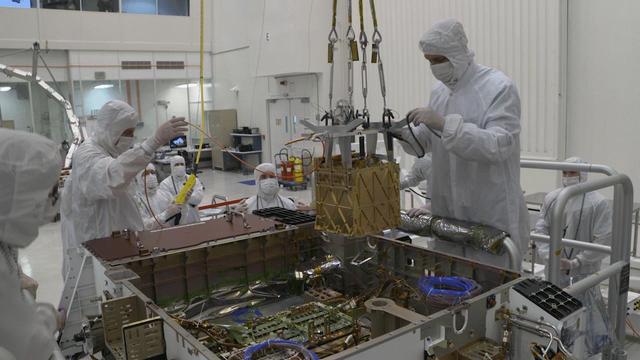 NASA image: Engineers Lower MOXIE into Perseverance