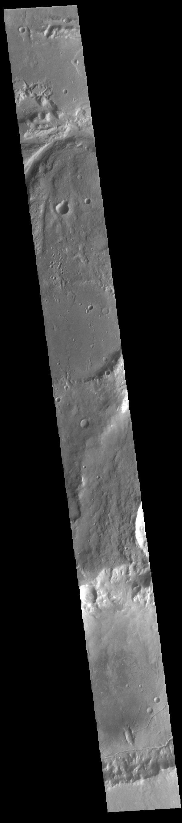 The top of today's VIS image shows a small section of Osuga Valles. Osuga Valles is a complex set of channels located near Eos Chasma. The channels were likely cut by multiple episodes of flowing water. Osuga Valles is 164km (101 miles) long.  Orbit Number: 83133 Latitude: -15.8555 Longitude: 322.044 Instrument: VIS Captured: 2020-09-10 11:36  https://photojournal.jpl.nasa.gov/catalog/PIA24189