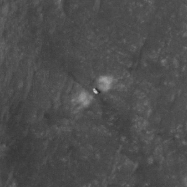 The High Resolution Imaging Experiment (HiRISE) camera aboard NASA's Mars Reconnaissance Orbiter (MRO) was able to capture this image of NASA's Perseverance rover on the surface of Mars. The image was taken on Feb. 19, 2021.  It is a close-up version of a larger image showing several parts of the Mars 2020 mission landing system that got the rover safely on the ground.  These close-ups of Mars 2020 hardware were processed to make them easier to see.  A key objective for Perseverance's mission on Mars is astrobiology, including the search for signs of ancient microbial life. The rover will characterize the planet's geology and past climate, pave the way for human exploration of the Red Planet, and be the first mission to collect and cache Martian rock and regolith (broken rock and dust).  Subsequent NASA missions, in cooperation with ESA (European Space Agency), would send spacecraft to Mars to collect these sealed samples from the surface and return them to Earth for in-depth analysis.  The Mars 2020 Perseverance mission is part of NASA's Moon to Mars exploration approach, which includes Artemis missions to the Moon that will help prepare for human exploration of the Red Planet.  https://photojournal.jpl.nasa.gov/catalog/PIA24334