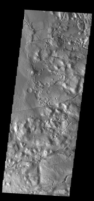 This VIS image shows part of Gorgonum Chaos. Chaotic regions form when groundwater escapes to the surface, undermining it and causing the ground to collapse. The linear depressions at the bottom of the image are part of Sirenum Fossae. Gorgonum Chaos is located in Terra Sirenum. Orbit Number: 84080 Latitude: -37.7334 Longitude: 189.356 Instrument: VIS Captured: 2020-11-27 10:17 https://photojournal.jpl.nasa.gov/catalog/PIA24369