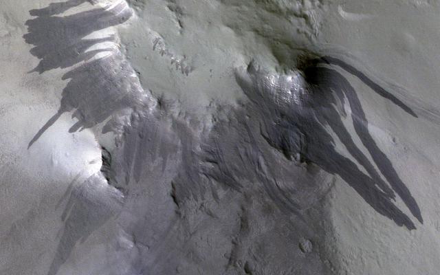 NASA image: Blast Waves and Dusty Landslides