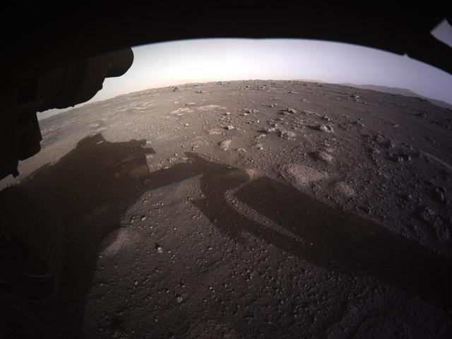 This is the first high-resolution, color image to be sent back by the Hazard Cameras (Hazcams) on the underside of NASA's Perseverance Mars rover after its landing on Feb. 18, 2021. A key objective for Perseverance's mission on Mars is astrobiology, including the search for signs of ancient microbial life. The rover will characterize the planet's geology and past climate, pave the way for human exploration of the Red Planet, and be the first mission to collect and cache Martian rock and regolith (broken rock and dust). Subsequent NASA missions, in cooperation with ESA (the European Space Agency), would send spacecraft to Mars to collect these cached samples from the surface and return them to Earth for in-depth analysis. https://photojournal.jpl.nasa.gov/catalog/PIA24430