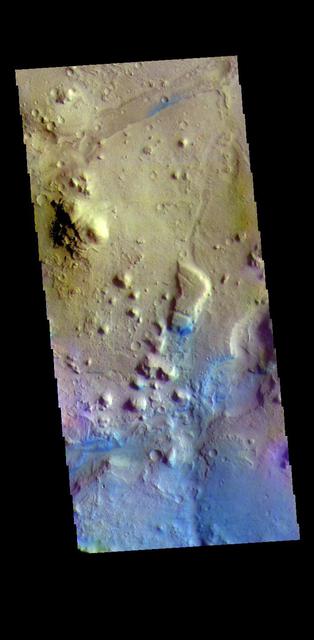 The THEMIS VIS camera contains 5 filters. The data from different filters can be combined in multiple ways to create a false color image. These false color images may reveal subtle variations of the surface not easily identified in a single band image. Today's false color image shows a small section of Nili Fossae. The linear depression at the top of the image is one of the Nili Fossae graben. Dark blue in this filter combination indicates basaltic sand. Orbit Number: 69580 Latitude: 25.2782 Longitude: 80.2868 Instrument: VIS Captured: 2017-08-21 06:55 https://photojournal.jpl.nasa.gov/catalog/PIA24452