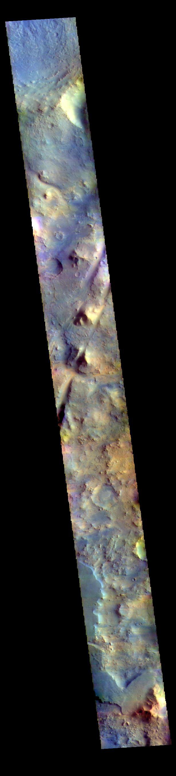 The THEMIS VIS camera contains 5 filters. The data from different filters can be combined in multiple ways to create a false color image. These false color images may reveal subtle variations of the surface not easily identified in a single band image. Today's false color image shows part of Nili Fossae. The linear depressions crossing the center of the image are graben, a landform created by the movement of blocks of material downward between paired faults.  Orbit Number: 69867 Latitude: 18.6065 Longitude: 76.3487 Instrument: VIS Captured: 2017-09-13 22:23  https://photojournal.jpl.nasa.gov/catalog/PIA24456
