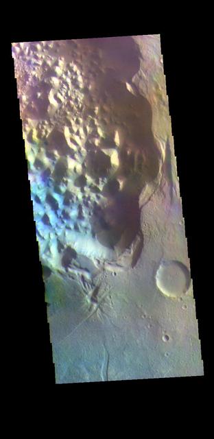 The THEMIS VIS camera contains 5 filters. The data from different filters can be combined in multiple ways to create a false color image. These false color images may reveal subtle variations of the surface not easily identified in a single band image. Today's false color image shows a small section of Hydaspis Chaos, one of many regions of chaos in Margaritifer Terra. The term chaos is applied to regions where the surface is being eroded to form mesas. As the surface processes continue individual mesas become more isolated and take on the appearance of regions of hills. Hydaspis Chaos is is part of the huge outflow system flowing from Valles Marineris to Chryse Planitia.  Orbit Number: 70332 Latitude: 1.90016 Longitude: 335.673 Instrument: VIS Captured: 2017-10-22 05:45  https://photojournal.jpl.nasa.gov/catalog/PIA24502