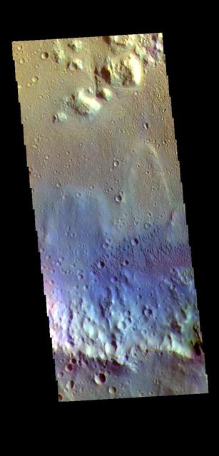 The THEMIS VIS camera contains 5 filters. The data from different filters can be combined in multiple ways to create a false color image. These false color images may reveal subtle variations of the surface not easily identified in a single band image. Today's false color image shows the floor of an unnamed crater in Tyrrhena Terra. Sand dunes are visible on the crater floor. Dark blue tones indicate basaltic sands. Orbit Number: 71862 Latitude: -5.32227 Longitude: 93.5361 Instrument: VIS Captured: 2018-02-25 06:52 https://photojournal.jpl.nasa.gov/catalog/PIA24514