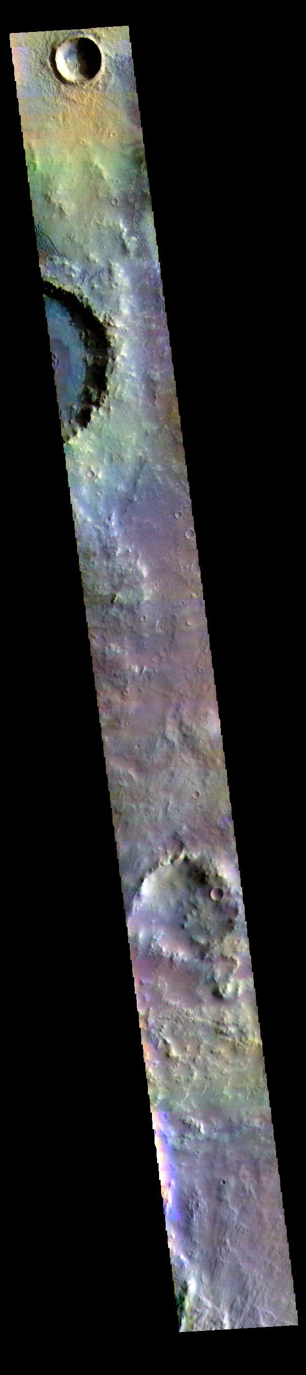The THEMIS VIS camera contains 5 filters. The data from different filters can be combined in multiple ways to create a false color image. These false color images may reveal subtle variations of the surface not easily identified in a single band image. Today's false color image shows part of the floor of Herschel Crater. Several regions of sand dunes are visible at the top of the image. Herschel Crater is 298 km (185 miles) in diameter and is located in Terra Cimmeria.  Orbit Number: 72235 Latitude: -15.0763 Longitude: 128.961 Instrument: VIS Captured: 2018-03-28 00:15  https://photojournal.jpl.nasa.gov/catalog/PIA24517