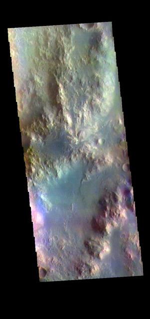 The THEMIS VIS camera contains 5 filters. The data from different filters can be combined in multiple ways to create a false color image. These false color images may reveal subtle variations of the surface not easily identified in a single band image. Today's false color image shows part of the rim of Holden Crater. Located in Noachis Terra, Holden Crater is 152km (94 miles) in diameter. Orbit Number: 72777 Latitude: -26.7099 Longitude: 327.236 Instrument: VIS Captured: 2018-05-11 15:45 https://photojournal.jpl.nasa.gov/catalog/PIA24518
