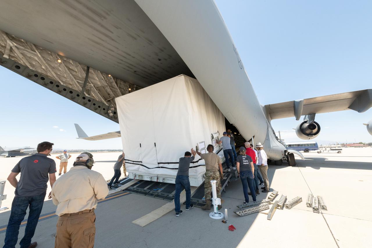 On June 27, 2021, teams from NASA's Jet Propulsion Laboratory in Southern California and the March Air Reserve Base in Riverside County, California, loaded the scientific heart of the Surface Water and Ocean Topography (SWOT) mission into a C-17 airplane. The hardware – which includes research instruments – is headed to a clean room facility near Cannes, France, where engineers and technicians will complete assembly of the satellite over the next year.  SWOT will make global surveys of Earth's surface water. By measuring its height, researchers can track the volume and location of the finite resource around the world. The data will help with monitoring changes in floodplains and wetlands, measure how much fresh water flows into and out of lakes and rivers and back to the ocean, and track regional shifts in sea level.  https://photojournal.jpl.nasa.gov/catalog/PIA24534