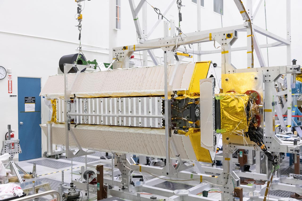 Part of the Surface Water and Ocean Topography (SWOT) satellite's science instrument payload sits in a clean room at NASA's Jet Propulsion Laboratory during assembly.  Once fully assembled and launched into orbit, the SUV-size spacecraft will make global surveys of Earth's surface water. By measuring the height of the water in the planet's ocean, lakes, and rivers, researchers can track the volume and location of the finite resource around the world. The data will help with monitoring changes in floodplains and wetlands, measure how much fresh water flows into and out of lakes and rivers and back to the ocean, and track regional shifts in sea level.  https://photojournal.jpl.nasa.gov/catalog/PIA24536