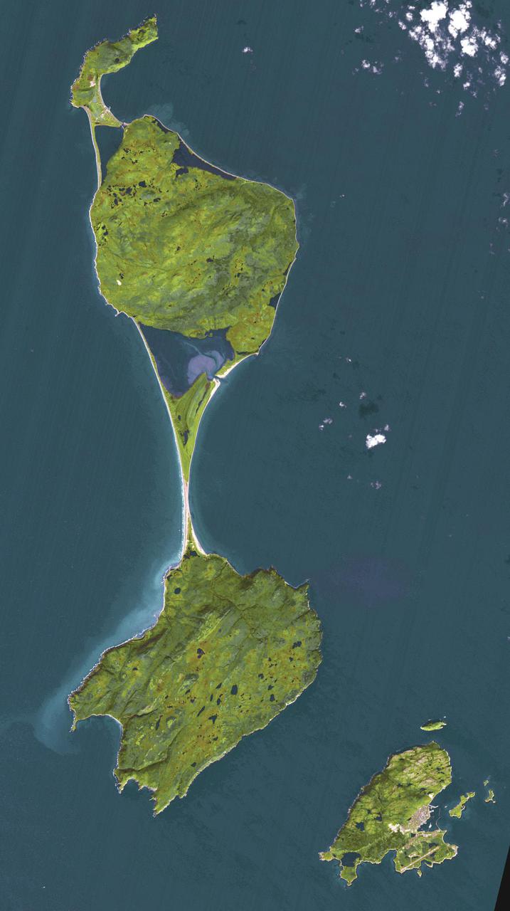 The Territorial Collectivity of Saint-Pierre and Miquelon is a self-governing overseas collectivity of France, off the southern coast of Newfoundland. It is the last remaining part of New France in North America to retain French sovereignty; its 6000 residents are French citizens. During the early part of its 500 year history, the island changed ownership numerous times between France and Britain. Only in 1816 were the islands permanently claimed by France, and French settlers came from Brittany, Normandy, and the Basque areas. The image was acquired September 27, 2011, covers an area of 25.5 by 45.6 km, and is located at 46.9 degrees north, 56.4 degrees west. https://photojournal.jpl.nasa.gov/catalog/PIA24554