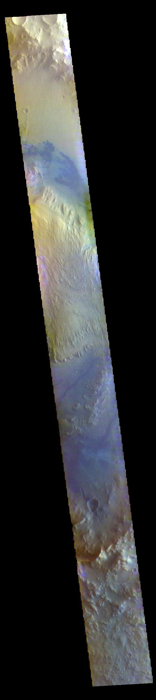 The THEMIS VIS camera contains 5 filters. The data from different filters can be combined in multiple ways to create a false color image. These false color images may reveal subtle variations of the surface not easily identified in a single band image. Today's false color image shows a cross section of Gale Crater, including the large layered deposit in the center of the crater floor. Gale Crater is the 'home' of the Curiosity Rover.  Orbit Number: 77287 Latitude: -5.53403 Longitude: 138.375 Instrument: VIS Captured: 2019-05-18 02:45  https://photojournal.jpl.nasa.gov/catalog/PIA24608