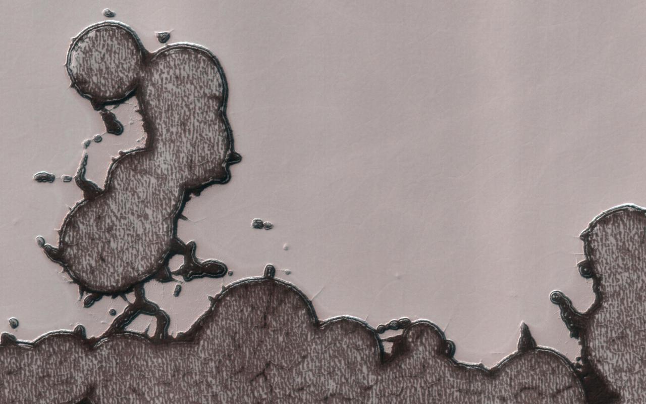 The south polar residual cap is constantly changing as carbon dioxide sublimates from steep slopes, enlarging pits, and condenses on flat areas, filling pits.  Sometimes the strange landscape produces something that looks familiar, like the mascot of a certain peanut company, who recently died in a commercial, and was "creamated" according to "Saturday Night Live."  At least, he still has Mars.  https://photojournal.jpl.nasa.gov/catalog/PIA24617