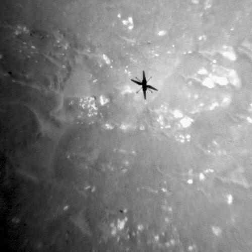 The shadow of NASA's Ingenuity Mars Helicopter can be seen in this animated GIF composed of images taken by its black-and-white navigation camera during the rotocraft's third flight, on April 25, 2021. The camera, which tracks surface features below the helicopter, takes images at a rate at which the helicopter's blades appear frozen in place, despite making 21 full rotations in-between each image. At full speed, the blades spin at 2,537 rpm. The images are aligned entirely using Ingenuity's on-board position tracking system highlighting the stability and accuracy of the navigation algorithm.  Movie available at https://photojournal.jpl.nasa.gov/catalog/PIA24644