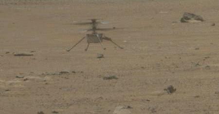 NASA's Ingenuity Mars Helicopter lands with a soft bounce after its fifth flight on May 7, 2021. The images in this GIF were captured by the Mastcam-Z imager aboard NASA's Perseverance rover.  Movie available at https://photojournal.jpl.nasa.gov/catalog/PIA24649