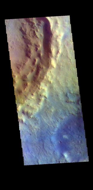 The THEMIS VIS camera contains 5 filters. The data from different filters can be combined in multiple ways to create a false color image. These false color images may reveal subtle variations of the surface not easily identified in a single band image. Today's false color image shows the southeastern rim of Toro Crater. Toro Crater is located in Syrtis Major Planum and is 41km (25miles) in diameter. Orbit Number: 79061 Latitude: 16.8233 Longitude: 72.1675 Instrument: VIS Captured: 2019-10-11 04:54 https://photojournal.jpl.nasa.gov/catalog/PIA24656