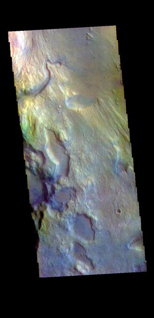 The THEMIS VIS camera contains 5 filters. The data from different filters can be combined in multiple ways to create a false color image. These false color images may reveal subtle variations of the surface not easily identified in a single band image. Today's false color image shows part of the main channel of Ares Vallis, as well as a small side tributary. Located in Margaritifer Terra, Ares Vallis is part of a large system of channels that arise in Valles Marineris and flow northward into Chryse Planitia.  Orbit Number: 79239 Latitude: 7.64196 Longitude: 338.056 Instrument: VIS Captured: 2019-10-25 20:37  https://photojournal.jpl.nasa.gov/catalog/PIA24660