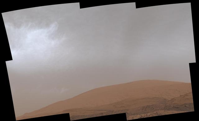 This GIF shows clouds drifting over Mount Sharp on Mars, as viewed by NASA's Curiosity rover on March 19, 2021, the 3,063rd Martian day, or sol, of the mission. Each frame of the scene was stitched together from six individual images. Movie available at https://photojournal.jpl.nasa.gov/catalog/PIA24661