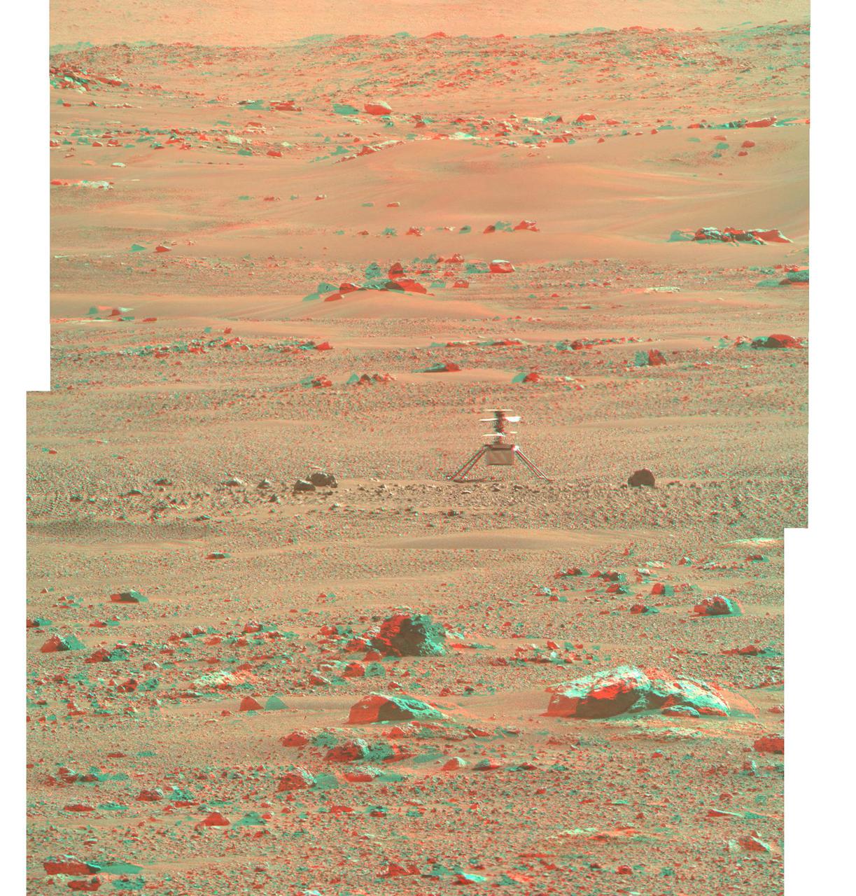 NASA's Ingenuity Mars Helicopter is seen here in 3D using images taken June 6, 2021 (the 105 the Martian day, or sol, of the mission), by the left and right Mastcam-Z cameras aboard NASA's Perseverance Mars rover.  The Ingenuity Mars Helicopter was built by JPL, which also manages the technology demonstration project for NASA Headquarters. It is supported by NASA's Science, Aeronautics Research, and Space Technology mission directorates. NASA's Ames Research Center in California's Silicon Valley, and NASA's Langley Research Center in Hampton, Virginia, provided significant flight performance analysis and technical assistance during Ingenuity's development. AeroVironment Inc., Qualcomm, and SolAero also provided design assistance and major vehicle components. Lockheed Martin Space designed and manufactured the Mars Helicopter Delivery System.  A key objective for Perseverance's mission on Mars is astrobiology, including the search for signs of ancient microbial life. The rover will characterize the planet's geology and past climate, pave the way for human exploration of the Red Planet, and be the first mission to collect and cache Martian rock and regolith (broken rock and dust).  Subsequent NASA missions, in cooperation with ESA (European Space Agency), would send spacecraft to Mars to collect these sealed samples from the surface and return them to Earth for in-depth analysis.  The Mars 2020 Perseverance mission is part of NASA's Moon to Mars exploration approach, which includes Artemis missions to the Moon that will help prepare for human exploration of the Red Planet.  https://photojournal.jpl.nasa.gov/catalog/PIA24670