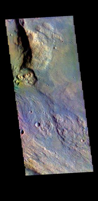 The THEMIS VIS camera contains 5 filters. The data from different filters can be combined in multiple ways to create a false color image. These false color images may reveal subtle variations of the surface not easily identified in a single band image. Today's false color image shows part of Margartifier Terra near Ares Vallis. Orbit Number: 80961 Latitude: 7.61436 Longitude: 339.521 Instrument: VIS Captured: 2020-03-15 15:33 https://photojournal.jpl.nasa.gov/catalog/PIA24679