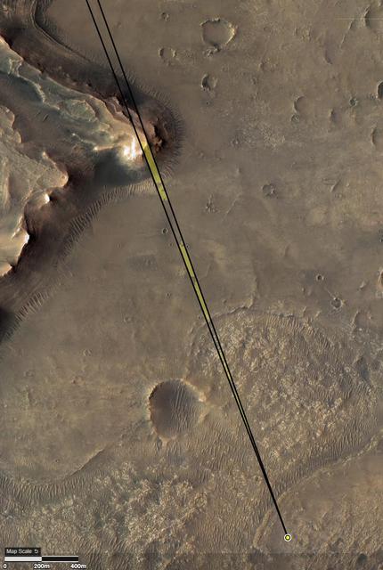 Provided by the High Resolution Imaging Experiment (HiRISE) aboard NASA's Mars Reconnaissance orbiter, this overhead image captures a portion of Mars' Jezero Crater. The yellow dot on lower right indicates the location of NASA's Perseverance rover. The field of view of the rover's Remote Microscopic Imager (RMI) camera is indicated with the diverging lines. The formation in the upper left is the "Delta Scarp," which the RMI camera photographed on March 17, 2021, from a distance of 1.4 miles (2.25 kilometers).  The University of Arizona, in Tucson, operates HiRISE, which was built by Ball Aerospace & Technologies Corp., in Boulder, Colorado. NASA's Jet Propulsion Laboratory, a division of Caltech in Pasadena, California, manages the Mars Reconnaissance Orbiter Project for NASA's Science Mission Directorate, Washington.  A key objective for Perseverance's mission on Mars is astrobiology, including the search for signs of ancient microbial life. The rover will characterize the planet's geology and past climate, pave the way for human exploration of the Red Planet, and be the first mission to collect and cache Martian rock and regolith (broken rock and dust).  Subsequent NASA missions, in cooperation with ESA (European Space Agency), would send spacecraft to Mars to collect these sealed samples from the surface and return them to Earth for in-depth analysis.  The Mars 2020 Perseverance mission is part of NASA's Moon to Mars exploration approach, which includes Artemis missions to the Moon that will help prepare for human exploration of the Red Planet.  https://photojournal.jpl.nasa.gov/catalog/PIA24685