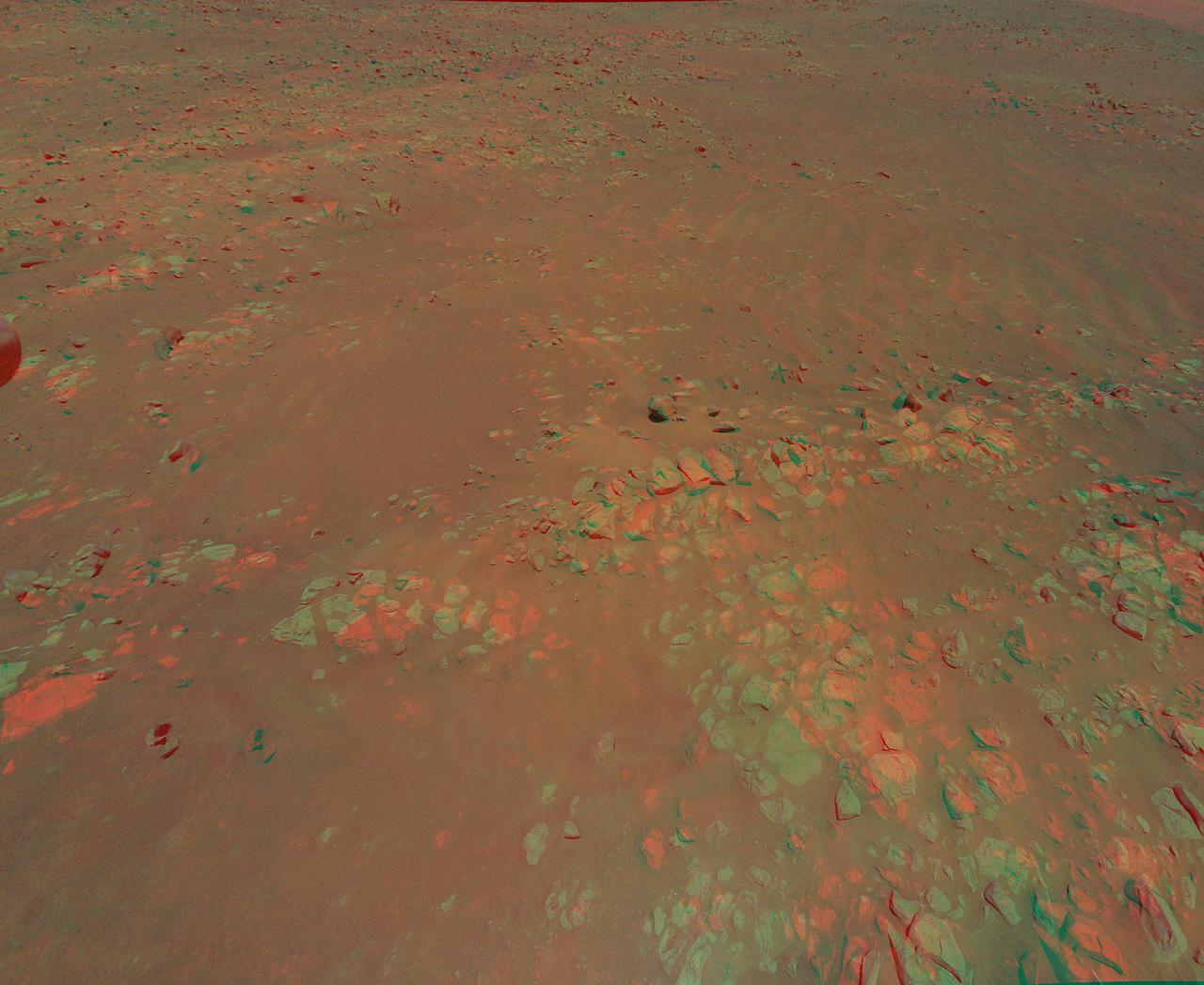 This 3D view of an area the Mars Perseverance rover team calls "Raised Ridges" was created from data collected by NASA's Ingenuity Mars Helicopter during its 10th flight at Mars on July 24, 2021. The stereo images of the geologic feature were taken at the request of the Mars Perseverance rover science team, which was considering visiting the ridges during the first science campaign. On Earth, similar fractures in desert environments might be a clue to past liquid water activity and thus past habitability.  The 3D view (or anaglyph) is best viewed with red-blue glasses. It was created by combining data from two images taken meters apart by the RTE camera aboard Ingenuity. At the time the two images were taken, Ingenuity was at an altitude of 40 feet (12 meters).   https://photojournal.jpl.nasa.gov/catalog/PIA24688