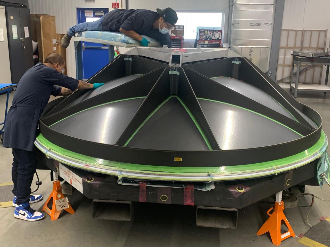The build of a high-gain antenna, a nearly 10-foot-wide (3-meter-wide) dish, is underway for NASA's Europa Clipper spacecraft. The dish antenna, seen here face down, is being fabricated at aerospace vendor Applied Aerospace Structures Corporation (AASC) in Stockton, California. The antenna was designed by the Johns Hopkins Applied Physics Laboratory (APL) in Laurel, Maryland, and AASC, where it will be integrated along with other telecommunications hardware, into the propulsion module. The antenna downloads science data and allows ground controllers to send and receive commands and data between Earth and the spacecraft in Jupiter orbit – more than a million times farther from Earth than the International Space Station orbits.  With an internal global ocean under a thick layer of ice, Jupiter's moon Europa may have the potential to harbor existing life. Europa Clipper will swoop around Jupiter on an elliptical path, dipping close to the moon on each flyby. Understanding Europa's habitability will help scientists better understand how life developed on Earth and the potential for finding life beyond our planet. Europa Clipper is set to launch in 2024.  https://photojournal.jpl.nasa.gov/catalog/PIA24785