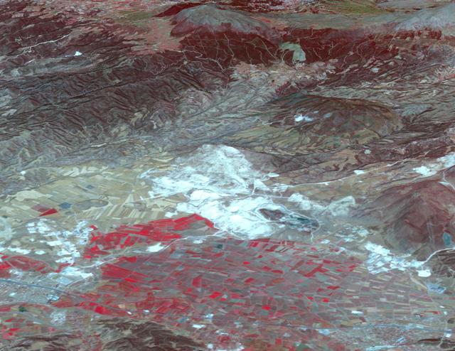 In western Turkey, Pamukkale travertine pools and terraces form the largest such complex in the world. For thousands of years, people have visited the area due to the attraction of the thermal pools. The ancient Greco-Roman city of Hierapolis was built on top of the travertine formation. The volcanic activity which causes the hot springs, forced carbon dioxide into a cave, which was called the place of the god Pluto, and instantly killed any animals (and people) that ventured in. The perspective image was acquired May 25, 2021, and is located at 37.9 degrees north, 29.1 degrees east.  https://photojournal.jpl.nasa.gov/catalog/PIA24868