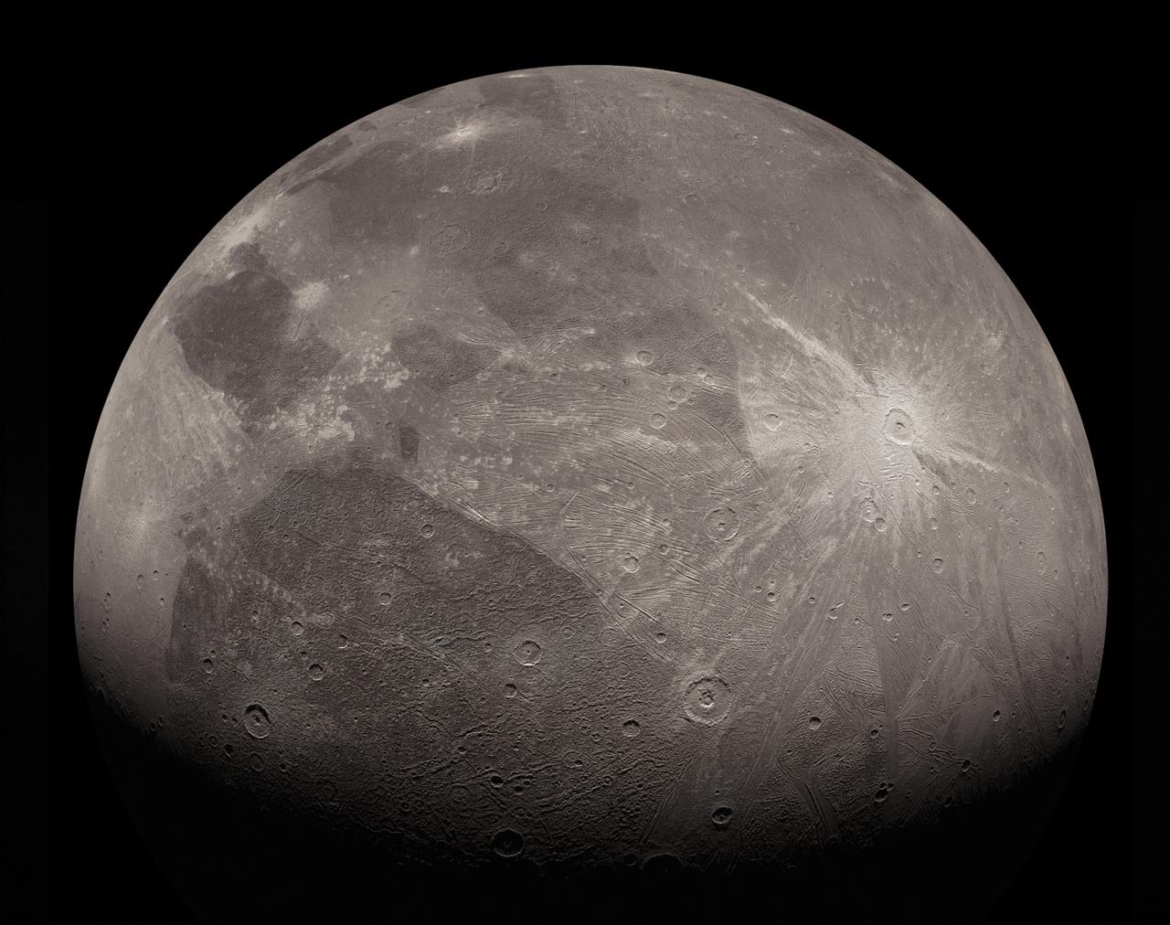 This enhanced image of the Jovian moon Ganymede was obtained by the JunoCam imager aboard NASA's Juno spacecraft during the mission's June 7, 2021, flyby of the icy moon on Juno's 34th pass close to Jupiter. This is an extended, upscaled and artistically enhanced version of a previously released JunoCam image: PIA24681.  The missing top part of the original JunoCam image has been reconstructed, for the most part, using an additional image. To make the new, enhanced image, small surface features have been extracted from elsewhere on Ganymede's surface.  During the June 7 flyby, Juno passed just 645 miles (1,038 kilometers) above the surface of the Ganymede, which is the solar system's largest moon. The spacecraft has been in orbit around Jupiter since July 4, 2016, but this was the first pass close to one of Jupiter's large moons.  Juno is a spin-stabilized spacecraft (with a rotation rate of 2 rpm), and the JunoCam imager has a fixed field of view. To obtain Ganymede images as Juno rotated, the camera acquired a strip at a time as the target passed through its field of view. These image strips were captured separately through red, green and blue filters. To generate the final image product, the strips must be stitched together and the colors aligned.  https://photojournal.jpl.nasa.gov/catalog/PIA25028