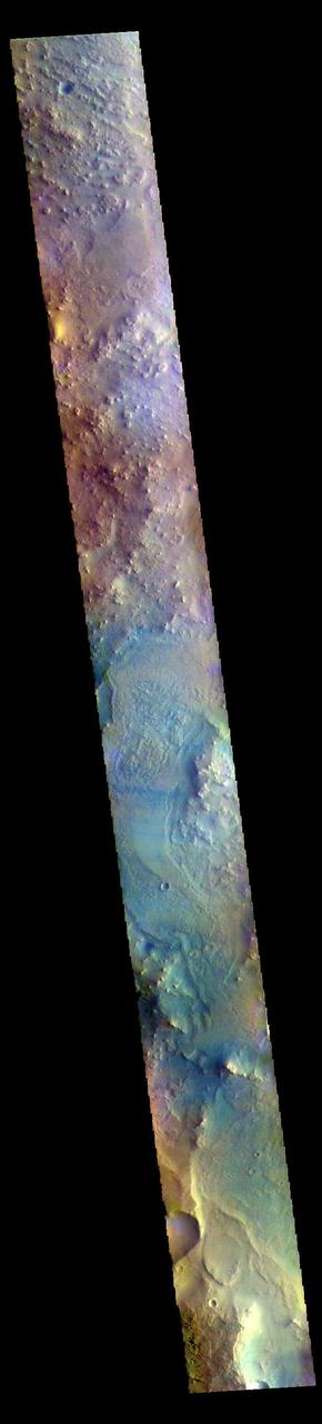 The THEMIS VIS camera contains 5 filters. The data from different filters can be combined in multiple ways to create a false color image. These false color images may reveal subtle variations of the surface not easily identified in a single band image. Today's false color image shows part of northern Syrtis Major Planum.  The THEMIS VIS camera is capable of capturing color images of the Martian surface using five different color filters. In this mode of operation, the spatial resolution and coverage of the image must be reduced to accommodate the additional data volume produced from using multiple filters. To make a color image, three of the five filter images (each in grayscale) are selected. Each is contrast enhanced and then converted to a red, green, or blue intensity image. These three images are then combined to produce a full color, single image. Because the THEMIS color filters don't span the full range of colors seen by the human eye, a color THEMIS image does not represent true color. Also, because each single-filter image is contrast enhanced before inclusion in the three-color image, the apparent color variation of the scene is exaggerated. Nevertheless, the color variation that does appear is representative of some change in color, however subtle, in the actual scene. Note that the long edges of THEMIS color images typically contain color artifacts that do not represent surface variation.  Orbit Number: 85463 Latitude: 17.4847 Longitude: 60.8084 Instrument: VIS Captured: 2021-03-21 08:04  https://photojournal.jpl.nasa.gov/catalog/PIA25058
