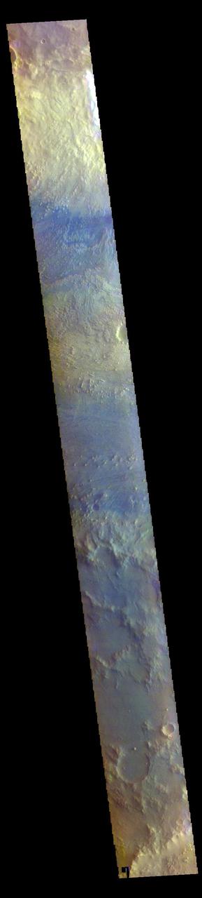 The THEMIS VIS camera contains 5 filters. The data from different filters can be combined in multiple ways to create a false color image. These false color images may reveal subtle variations of the surface not easily identified in a single band image. Today's false color image shows a cross section of Crommelin Crater. This crater contains a large mound of layered materials on the crater floor (center of image). This material was deposited after the crater formed. Crommelin Crater is one a several craters in the vicinity that contain large mounds of material on the crater floor. Crommelin Crater is 114 km (71 miles) in diameter and is located near Meridiani Planum.  The THEMIS VIS camera is capable of capturing color images of the Martian surface using five different color filters. In this mode of operation, the spatial resolution and coverage of the image must be reduced to accommodate the additional data volume produced from using multiple filters. To make a color image, three of the five filter images (each in grayscale) are selected. Each is contrast enhanced and then converted to a red, green, or blue intensity image. These three images are then combined to produce a full color, single image. Because the THEMIS color filters don't span the full range of colors seen by the human eye, a color THEMIS image does not represent true color. Also, because each single-filter image is contrast enhanced before inclusion in the three-color image, the apparent color variation of the scene is exaggerated. Nevertheless, the color variation that does appear is representative of some change in color, however subtle, in the actual scene. Note that the long edges of THEMIS color images typically contain color artifacts that do not represent surface variation.  Orbit Number: 85478 Latitude: 4.57872 Longitude: 349.844 Instrument: VIS Captured: 2021-03-22 13:38  https://photojournal.jpl.nasa.gov/catalog/PIA25059