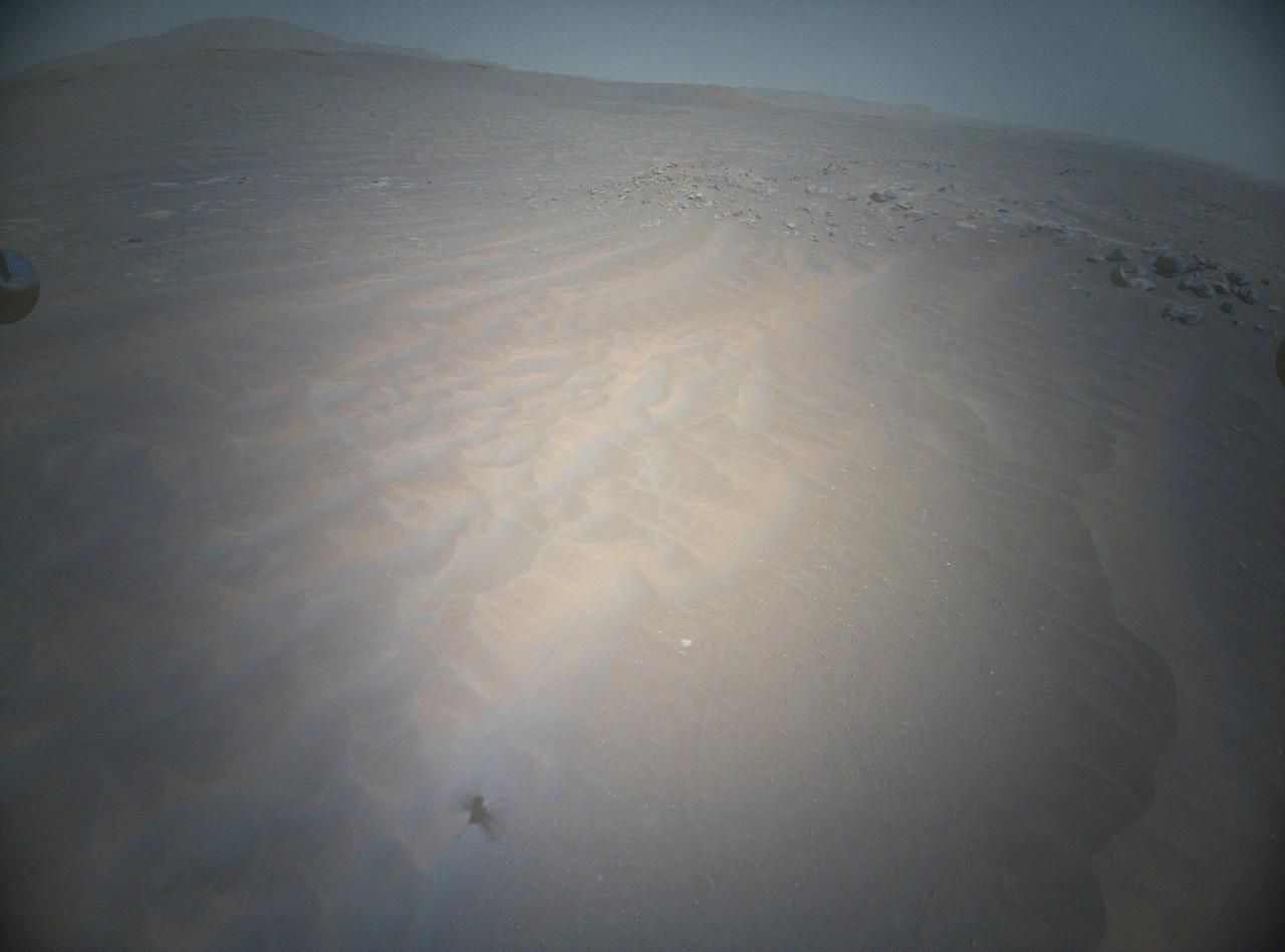 NASA's Ingenuity Mars Helicopter acquired this image in the northwest portion of a region of Mars known as "Séítah" using its high-resolution color camera during its 20th flight on Feb. 25, 2022.  https://photojournal.jpl.nasa.gov/catalog/PIA25079