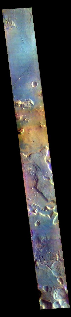 The THEMIS VIS camera contains 5 filters. The data from different filters can be combined in multiple ways to create a false color image. These false color images may reveal subtle variations of the surface not easily identified in a single band image. Today's false color image shows part of northern Arabia Terra. Arabia Terra is one of the oldest surface regions on Mars and contains a large variety of surface features. The region is dissected with numerous unnamed channels of all sizes and complexities, as well as numerous pits of unknown origin. The THEMIS VIS camera is capable of capturing color images of the Martian surface using five different color filters. In this mode of operation, the spatial resolution and coverage of the image must be reduced to accommodate the additional data volume produced from using multiple filters. To make a color image, three of the five filter images (each in grayscale) are selected. Each is contrast enhanced and then converted to a red, green, or blue intensity image. These three images are then combined to produce a full color, single image. Because the THEMIS color filters don't span the full range of colors seen by the human eye, a color THEMIS image does not represent true color. Also, because each single-filter image is contrast enhanced before inclusion in the three-color image, the apparent color variation of the scene is exaggerated. Nevertheless, the color variation that does appear is representative of some change in color, however subtle, in the actual scene. Note that the long edges of THEMIS color images typically contain color artifacts that do not represent surface variation. Orbit Number: 85790 Latitude: 32.1208 Longitude: 345.196 Instrument: VIS Captured: 2021-04-17 06:20 https://photojournal.jpl.nasa.gov/catalog/PIA25094