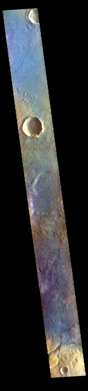The THEMIS VIS camera contains 5 filters. The data from different filters can be combined in multiple ways to create a false color image. These false color images may reveal subtle variations of the surface not easily identified in a single band image. Today's false color image shows part of the eastern boundary of Syrtis Major Planum. The channel at the bottom of the image is unnamed. The THEMIS VIS camera is capable of capturing color images of the Martian surface using five different color filters. In this mode of operation, the spatial resolution and coverage of the image must be reduced to accommodate the additional data volume produced from using multiple filters. To make a color image, three of the five filter images (each in grayscale) are selected. Each is contrast enhanced and then converted to a red, green, or blue intensity image. These three images are then combined to produce a full color, single image. Because the THEMIS color filters don't span the full range of colors seen by the human eye, a color THEMIS image does not represent true color. Also, because each single-filter image is contrast enhanced before inclusion in the three-color image, the apparent color variation of the scene is exaggerated. Nevertheless, the color variation that does appear is representative of some change in color, however subtle, in the actual scene. Note that the long edges of THEMIS color images typically contain color artifacts that do not represent surface variation. Orbit Number: 85812 Latitude: 17.5754 Longitude: 72.5741 Instrument: VIS Captured: 2021-04-19 01:44 https://photojournal.jpl.nasa.gov/catalog/PIA25095