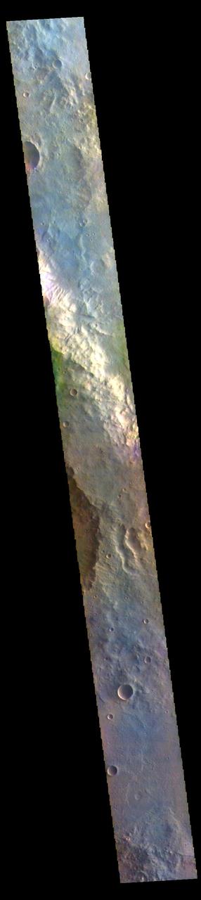 The THEMIS VIS camera contains 5 filters. The data from different filters can be combined in multiple ways to create a false color image. These false color images may reveal subtle variations of the surface not easily identified in a single band image. Today's false color image shows part of Oenotria Scopuli, which is the bright cliff in the center of the image. Oenotria Scopuli is located in Terra Sabaea.  The THEMIS VIS camera is capable of capturing color images of the Martian surface using five different color filters. In this mode of operation, the spatial resolution and coverage of the image must be reduced to accommodate the additional data volume produced from using multiple filters. To make a color image, three of the five filter images (each in grayscale) are selected. Each is contrast enhanced and then converted to a red, green, or blue intensity image. These three images are then combined to produce a full color, single image. Because the THEMIS color filters don't span the full range of colors seen by the human eye, a color THEMIS image does not represent true color. Also, because each single-filter image is contrast enhanced before inclusion in the three-color image, the apparent color variation of the scene is exaggerated. Nevertheless, the color variation that does appear is representative of some change in color, however subtle, in the actual scene. Note that the long edges of THEMIS color images typically contain color artifacts that do not represent surface variation.  Orbit Number: 85962 Latitude: -5.59203 Longitude: 68.4149 Instrument: VIS Captured: 2021-05-01 10:01  https://photojournal.jpl.nasa.gov/catalog/PIA25099
