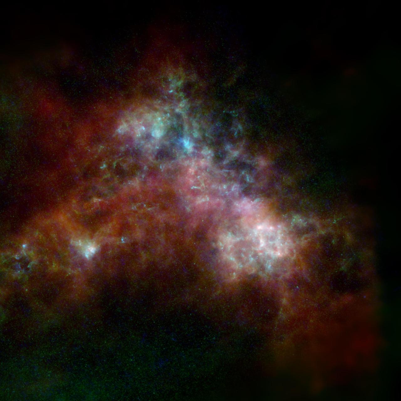 The Small Magellanic Cloud, shown here, is a dwarf galaxy orbiting the Milky Way. The image includes data from the ESA (European Space Agency) Herschel mission, supplemented with data from ESA's retired Planck observatory and two retired NASA missions: the Infrared Astronomical Satellite (IRAS) and Cosmic Background Explorer (COBE).      Operated from 2009 to 2013, Herschel detected wavelengths of light in the far-infrared and microwave ranges, and was ideal for studying dust in nearby galaxies because it could capture small-scale structures in the dust clouds in high resolution. However, Herschel often couldn't detect light from diffuse dust clouds – especially in the outer regions of galaxies, where the gas and dust become sparse and thus fainter. As a result, the mission missed up to 30% of all the light given off by dust. Combining the Herschel observations with data from other observatories creates a more complete picture of the dust in the galaxy.      In the image, red indicates hydrogen gas; green indicates cold dust; and warmer dust is shown in blue. Launched in 1983, IRAS was the first space telescope to detect infrared light, setting the stage for future observatories like NASA's Spitzer Space Telescope and James Webb Space Telescope. The Planck observatory, launched in 2009, and COBE, launched in 1989, both studied the cosmic microwave background, or light left over from the big bang.      The hydrogen gas was detected using the Parkes Radio Telescope and the Australia Compact Telescope Array, located in Australia and managed by the Commonwealth Scientific and Industrial Research Organisation (CSIRO); and the NANTEN2 Observatory in the Atacama Desert in Chile.  https://photojournal.jpl.nasa.gov/catalog/PIA25164