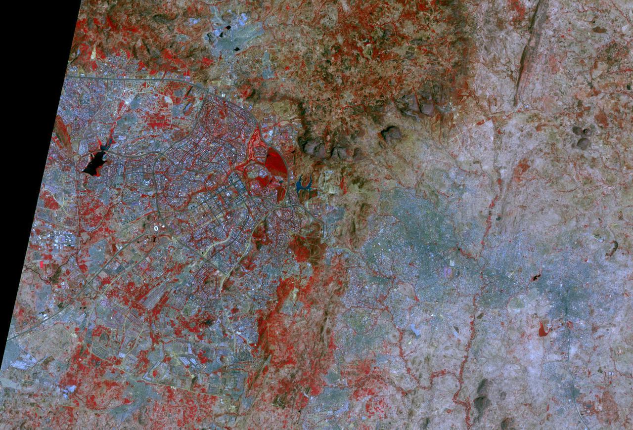 Abuja, the capital of Nigeria, is one of the fastest growing cities in Africa. It was developed as a planned city, replacing Lagos, the country's most populous city, as the capital in 1991. By 2000, the population was about 800,000; by 2020, the city, and its adjoining urban area of Karu to the east, had grown to over 6 million. The images were acquired December 2, 2003 and March 5, 2021. They are located at 9.1 degrees north, 7.5 degrees east, and cover an area of 25.5 by 37.5 km. https://photojournal.jpl.nasa.gov/catalog/PIA25186