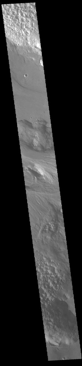 Today's VIS image shows part of Hydaspis Chaos, one of many regions of chaos in Margaritifer Terra. Chaos terrain is typified by mesas and valleys. The initial breakup of the surface can be due to tectonic forces, although on Mars it is thought that the mode of formation involves release of melted subsurface ice. With time and erosion the valleys widen and the mesas grow smaller. Hydaspis Chaos is is part of the huge outflow system flowing from Valles Marineris to Chryse Planitia. The channel in the center of the image becomes part of the larger Tiu Valles channel. Orbit Number: 87600 Latitude: 3.42796 Longitude: 332.822 Instrument: VIS Captured: 2021-09-13 06:56 https://photojournal.jpl.nasa.gov/catalog/PIA25228