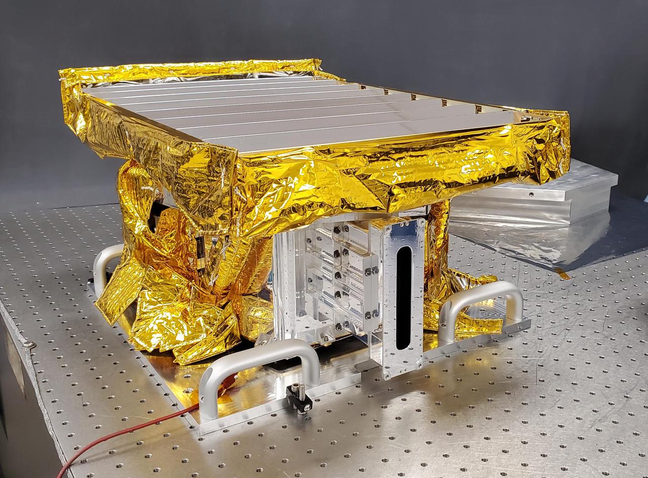 The High-resolution Volatiles and Minerals Moon Mapper (HVM³) sits in a clean room at NASA's Jet Propulsion Laboratory in Southern California in early December 2022. The JPL-built instrument was later shipped to Lockheed Martin Space in Littleton, Colorado, to be integrated with NASA's Lunar Trailblazer spacecraft.  HVM³ is an imaging spectrometer that will detect and map water on the Moon's surface to determine its abundance, location, form, and how it changes over time. A second instrument, the Lunar Thermal Mapper infrared multispectral imager, is being developed by the University of Oxford in the U.K. and is scheduled for delivery and integration in early 2023. Lunar Trailblazer was selected under NASA's Small Innovative Missions for Planetary Exploration (SIMPLEx) program in 2019.  The Lunar Trailblazer mission is managed by JPL and its science investigation is led by Caltech in Pasadena, California. Managed for NASA by Caltech, JPL also provides system engineering, mission assurance, the HVM³ instrument, as well as navigation. Lockheed Martin Space provides the spacecraft and integrates the flight system, under contract with Caltech.  SIMPLEx mission investigations are managed by the Planetary Missions Program Office at NASA's Marshall Space Flight Center in Huntsville, Alabama, as part of the Discovery Program at NASA Headquarters in Washington. The program conducts space science investigations in the Planetary Science Division of NASA's Science Mission Directorate at NASA Headquarters.  https://photojournal.jpl.nasa.gov/catalog/PIA25256