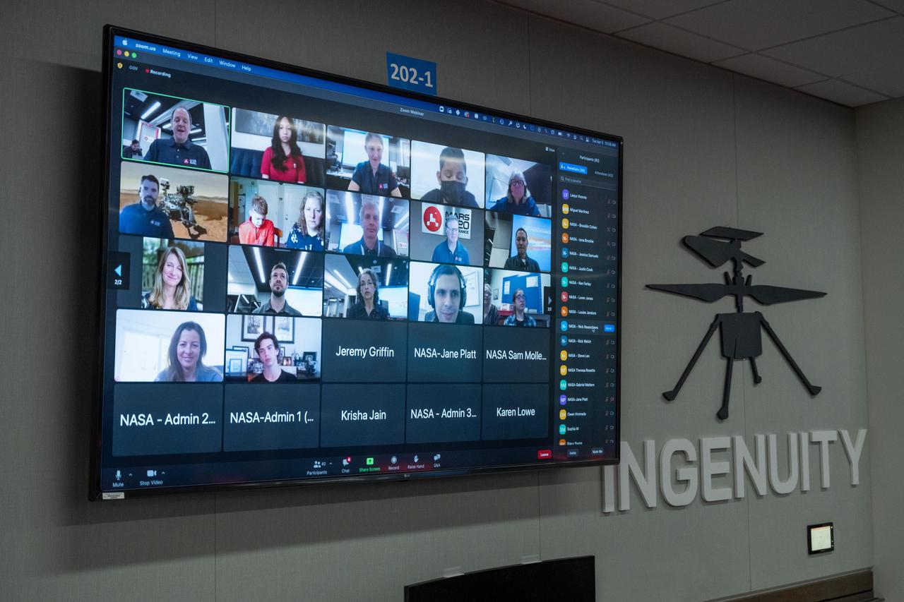 An April 5, 2022, virtual video event is seen on a monitor in the Mars Perseverance rover control room at NASA's Jet Propulsion Laboratory in Southern California. Team members interacted with students who have overcome academic obstacles, and the students received personalized messages from the rover on Mars.  https://photojournal.jpl.nasa.gov/catalog/PIA25273