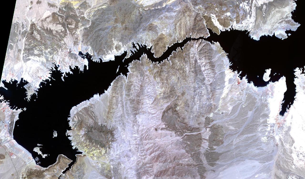 Lake Mead, America's largest reservoir, on the Colorado River between Nevada and Arizona, has shrunk to historic lows, dropping to about 30% of its capacity. The reservoir provides water to 25 million people in California, Arizona, Nevada, and Mexico. The water level has fallen from 1204 feet in 2000, to an all-time low of 1049" yesterday. The images were acquired May 19, 2000 and May 25 2022, cover an area of 20.5 by 34.9 km, and are located at 36.1 degrees north, 114.6 degrees west.  https://photojournal.jpl.nasa.gov/catalog/PIA25279