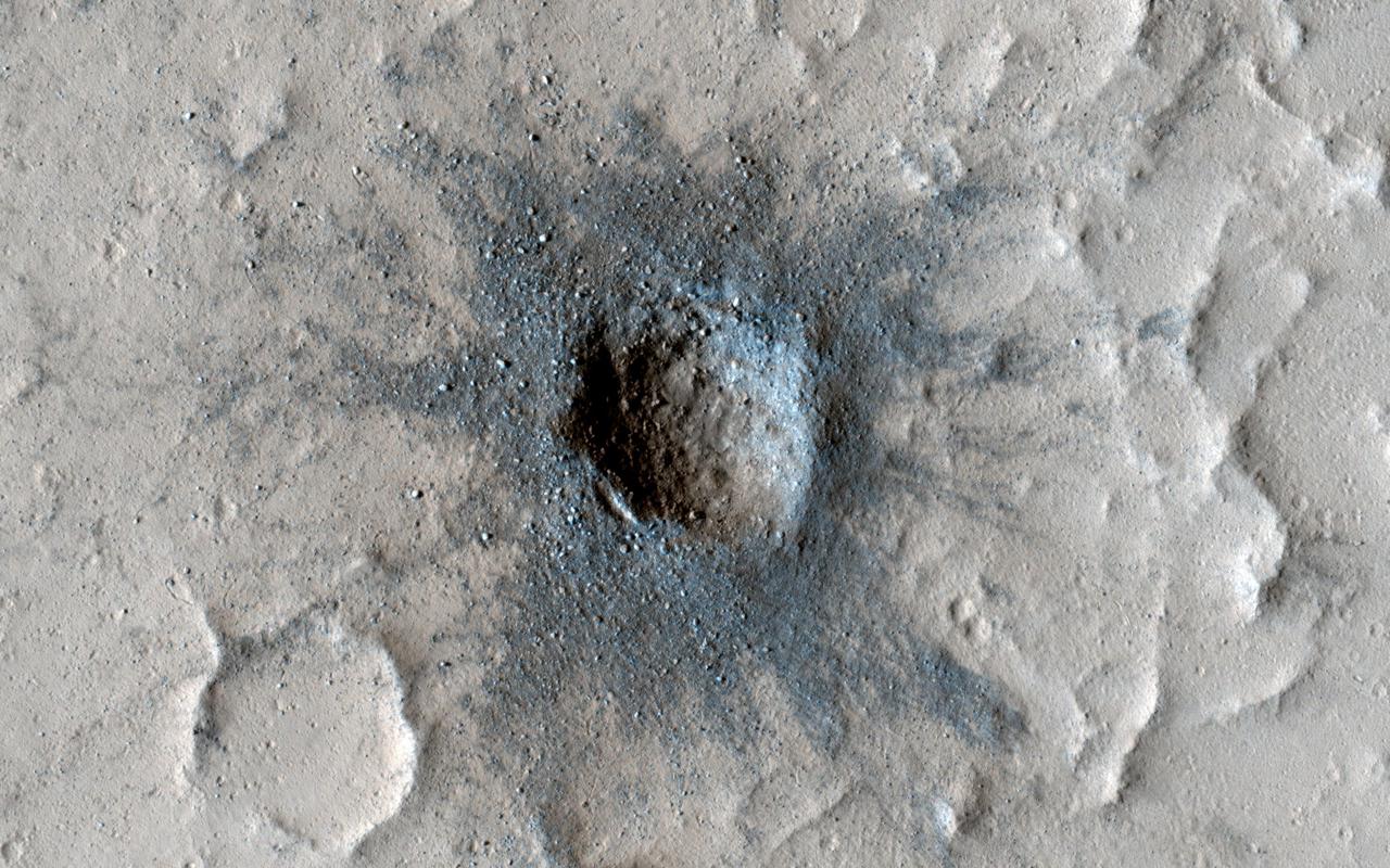 Slow Changes at an Old Impact Crater