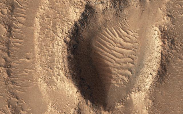 NASA image: Flooded Impact Craters in Hebrus Valles