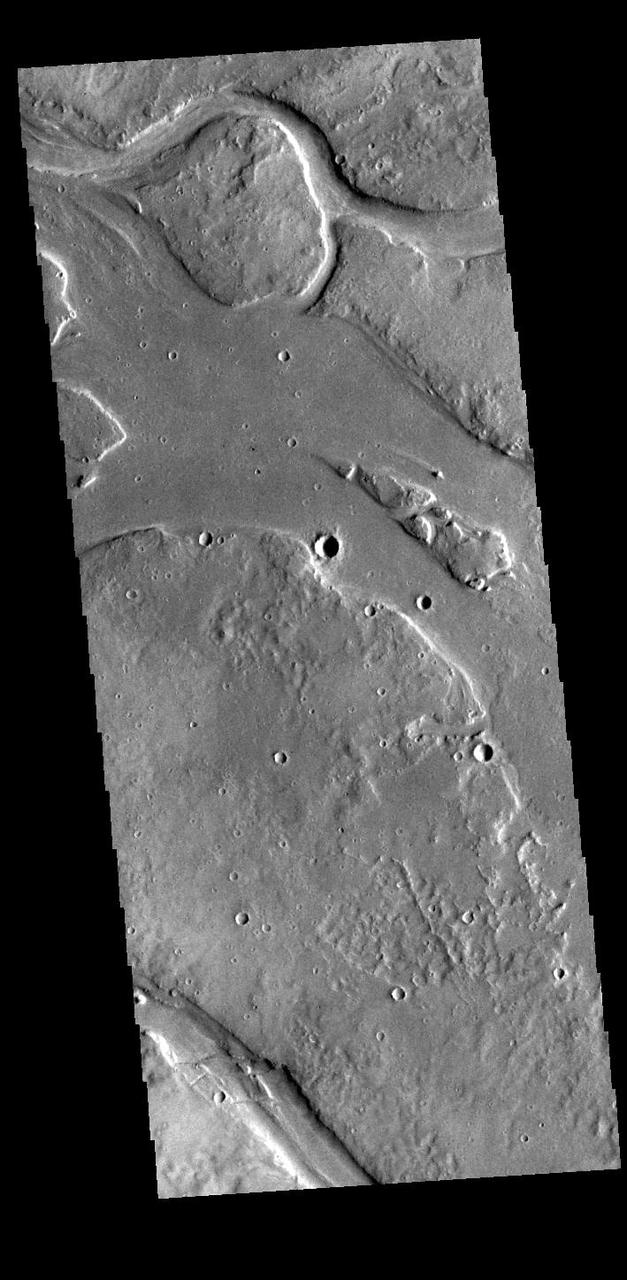 This VIS image shows many of the channel segments of Granicus Valles. Granicus Valles is a complex channel system located west of Elysium Mons. The system is approximately 750km long. It is likely that both water and lava played a part in creation of the feature. Orbit Number: 89541 Latitude: 27.8744 Longitude: 132.073 Instrument: VIS Captured: 2022-02-20 02:50 https://photojournal.jpl.nasa.gov/catalog/PIA25378