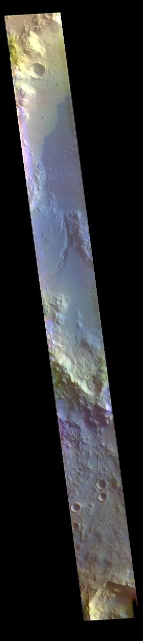 The THEMIS VIS camera contains 5 filters. The data from different filters can be combined in multiple ways to create a false color image. These false color images may reveal subtle variations of the surface not easily identified in a single band image. Today's false color image shows Gale Crater. Gale Crater is the home of the Curiosity Rover. The THEMIS VIS camera is capable of capturing color images of the Martian surface using five different color filters. In this mode of operation, the spatial resolution and coverage of the image must be reduced to accommodate the additional data volume produced from using multiple filters. To make a color image, three of the five filter images (each in grayscale) are selected. Each is contrast enhanced and then converted to a red, green, or blue intensity image. These three images are then combined to produce a full color, single image. Because the THEMIS color filters don't span the full range of colors seen by the human eye, a color THEMIS image does not represent true color. Also, because each single-filter image is contrast enhanced before inclusion in the three-color image, the apparent color variation of the scene is exaggerated. Nevertheless, the color variation that does appear is representative of some change in color, however subtle, in the actual scene. Note that the long edges of THEMIS color images typically contain color artifacts that do not represent surface variation. Orbit Number: 87507 Latitude: -6.02215 Longitude: 137.01 Instrument: VIS Captured: 2021-09-05 15:06 https://photojournal.jpl.nasa.gov/catalog/PIA25383