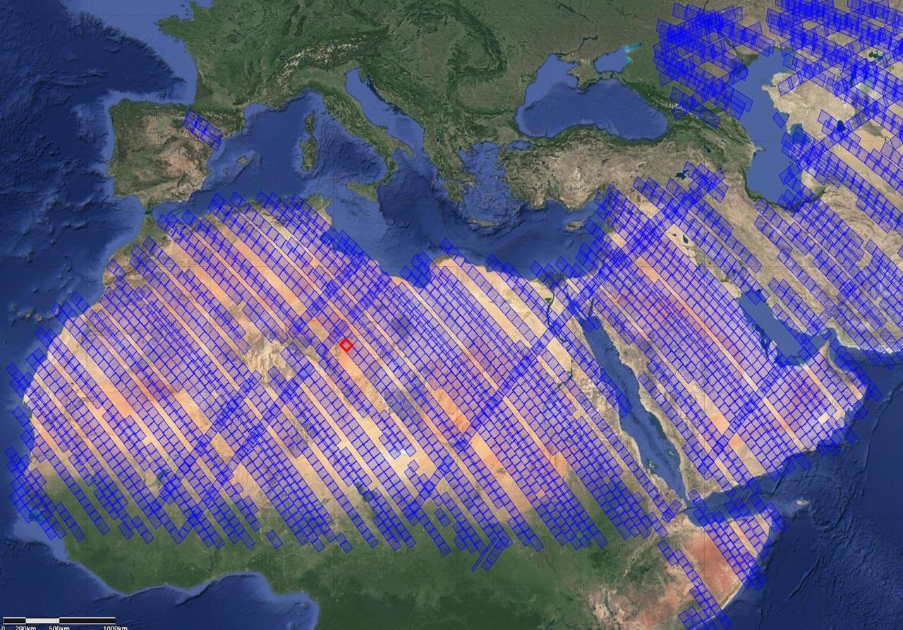 This image shows locations in parts of North Africa, Europe, the Middle East, and Central Asia observed by NASA's Earth Surface Mineral Dust Source Investigation (EMIT). Each blue box is a "scene" the instrument, which is aboard the International Space Station, has captured. The red box indicates where the instrument recently gathered data on three minerals in a location in southwest Libya, in the Sahara Desert.  Installed on the space station in July 2022, EMIT orbits Earth about once every 90 minutes to map the world's mineral-dust sources, gathering information about surface composition as the instrument completes about 16 orbits per day.  Over the course of its 12-month mission, EMIT will collect measurements of 10 important surface minerals – kaolinite, hematite, goethite, illite, vermiculite, calcite, dolomite, montmorillonite, chlorite, and gypsum – in arid regions between 50-degree south and north latitudes in Africa, Asia, North and South America, and Australia. The data EMIT collects will help scientists better understand the role of airborne dust particles in heating and cooling Earth's atmosphere on global and regional scales.  https://photojournal.jpl.nasa.gov/catalog/PIA25429