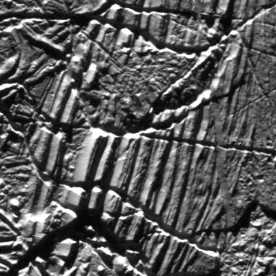       This mosaic shows a portion of one of the highest-resolution images captured of Jupiter's moon Europa in the 1990s by NASA's Galileo spacecraft. This picture is cropped from a larger image. These are the kind of features studied by scientists who recently modeled how moonquakes may trigger landslides on icy moons circling Jupiter and Saturn.      Visible here are possible fault scarps (like those found on Earth when tectonic activity breaks the crust) with smooth slopes and nearby rubble that may have been produced by small landslides triggered by the faulting activity.      These images were obtained on Nov. 6, 1997, when Galileo was approximately 1,983 miles (3,250 kilometers) from Europa.      NASA's Jet Propulsion Laboratory in Southern California managed the mission for the agency. JPL is a division of Caltech in Pasadena, California.  https://photojournal.jpl.nasa.gov/catalog/PIA25498