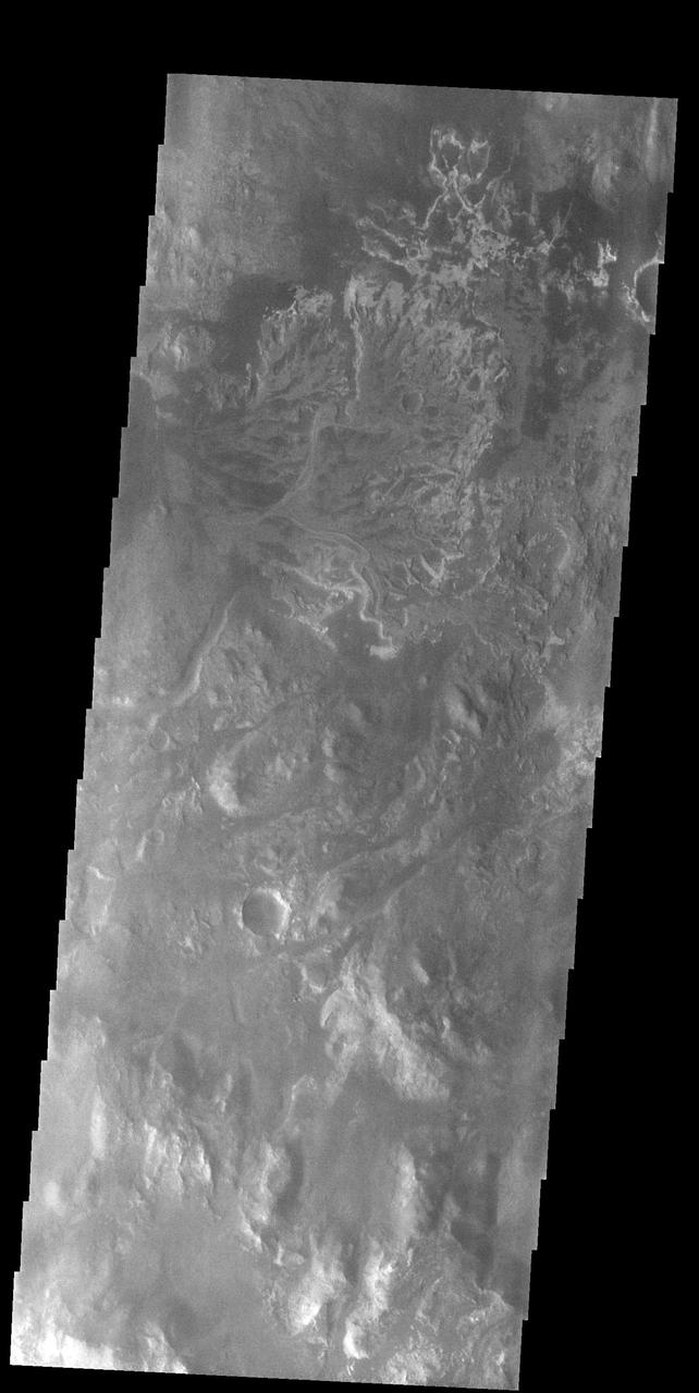 In the top half of today's VIS image is the delta deposit on the floor of Eberswalde Crater. Deltas are formed when sediment laden rivers slow down – either due to a flattening of topography, or entering a standing body of water. The reduction in velocity causes the sediments to be deposited. The main channel often diverges into numerous smaller channel that spread apart to form the typical fan shape of a delta. The Eberswalde Crater delta is one of the best preserved on Mars.  Orbit Number: 91288 Latitude: -23.9644 Longitude: 326.398 Instrument: VIS Captured: 2022-07-13 22:12  https://photojournal.jpl.nasa.gov/catalog/PIA25543